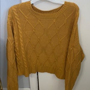 •Mustard sweater
